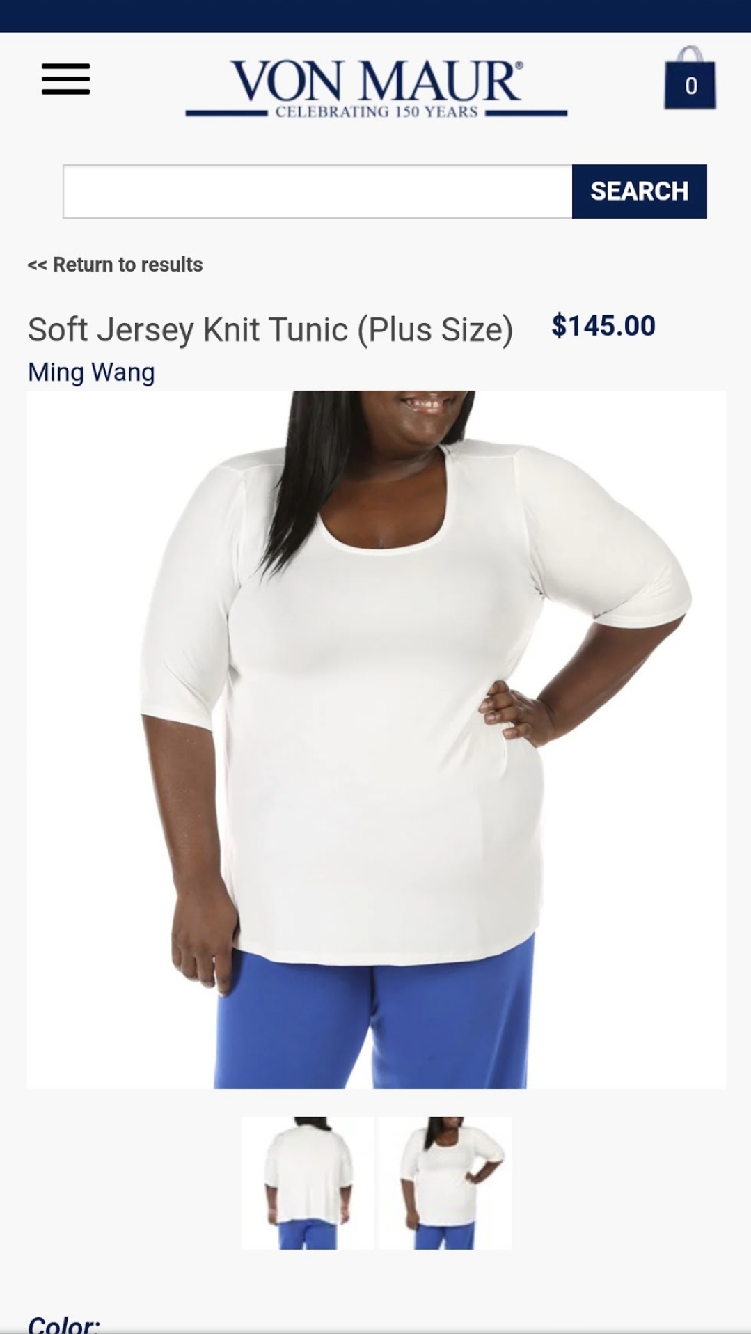 A white tunic paired with vivid blue pants creates a clean, relaxed look. This Von Maur product image showcases Erica’s commercial modeling work and the garment’s fit and silhouette.