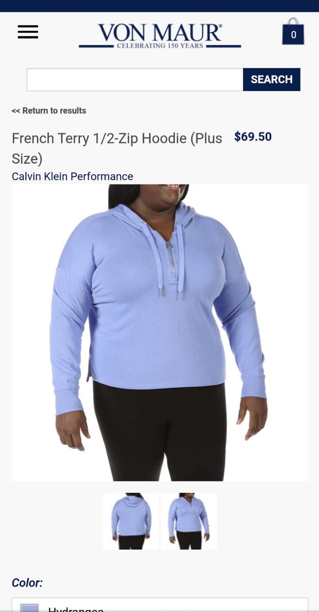 A lavender half-zip hoodie and black pants bring a casual, sporty look to this portfolio selection, expanding the range of clothing represented in Erica’s work.
