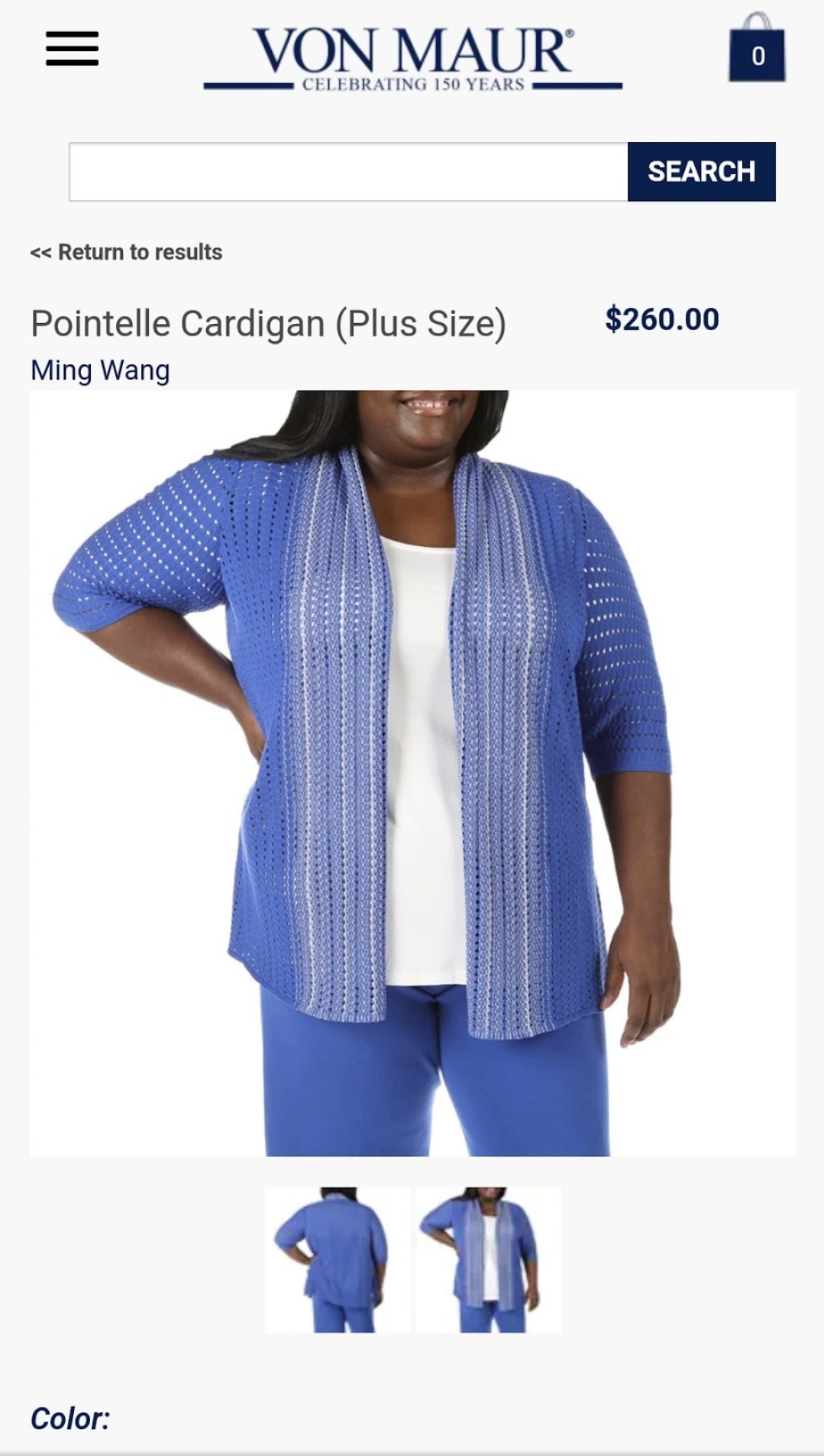 A blue open-front cardigan layered over a striped top introduces color and texture, showing how commercial modeling can communicate a complete styled outfit.