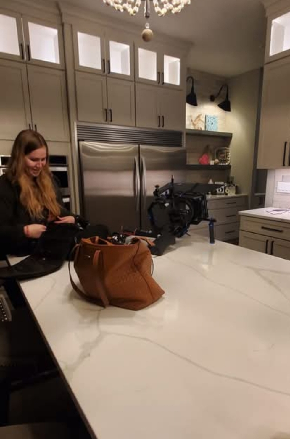 Behind the scenes of Leavin’ — camera equipment and crew in the kitchen